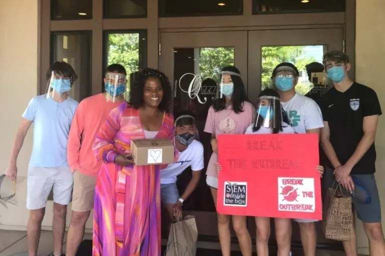 Volunteers delivering face shields